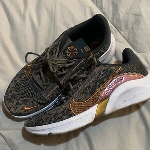 Nike Black and Gold Athletic Shoes